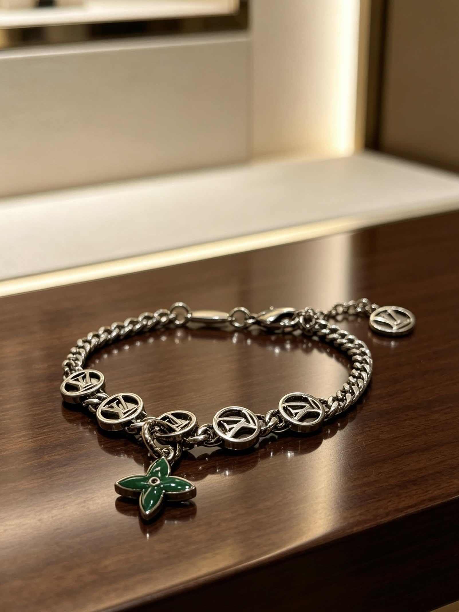 Louis Vuitton Silver Bracelet with Green Enamel Flower